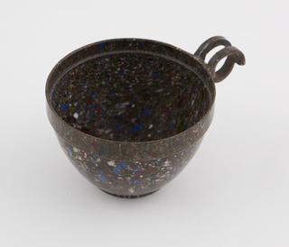 One cup from set of stacking cups and saucers