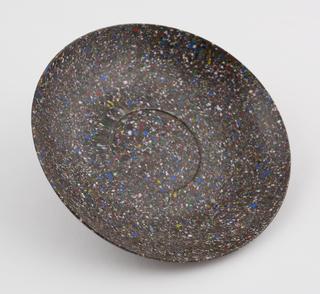 One saucer from set of stacking cups and saucers