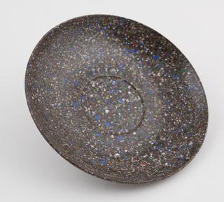 One saucer from set of stacking cups and saucers