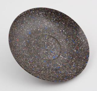 One saucer from set of stacking cups and saucers