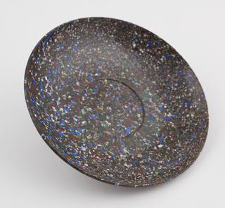 One saucer from set of stacking cups and saucers