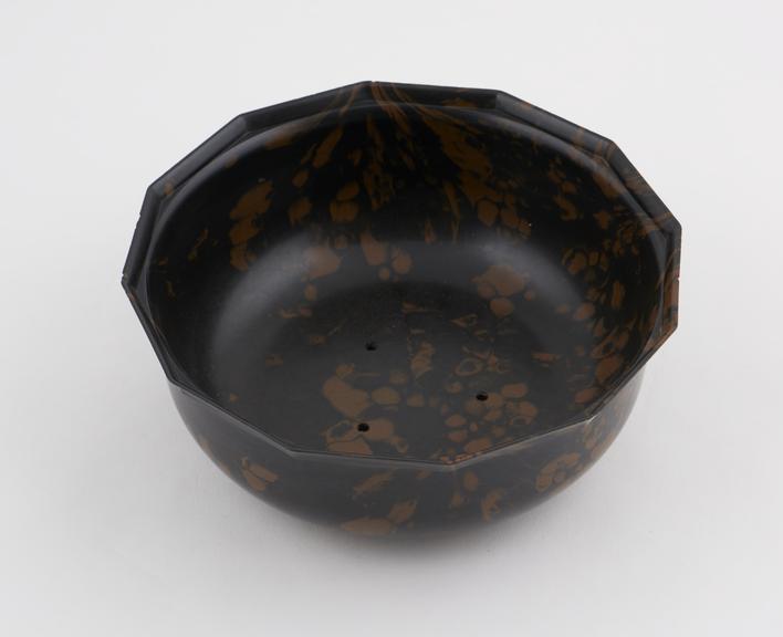 Bowl of dark brown/buff/green mottled phenolic plastic