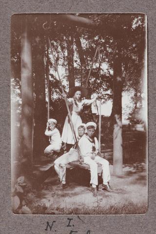 Children Swinging in the Garden