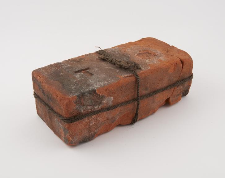 Light red, rectangular tax brick from Kingham