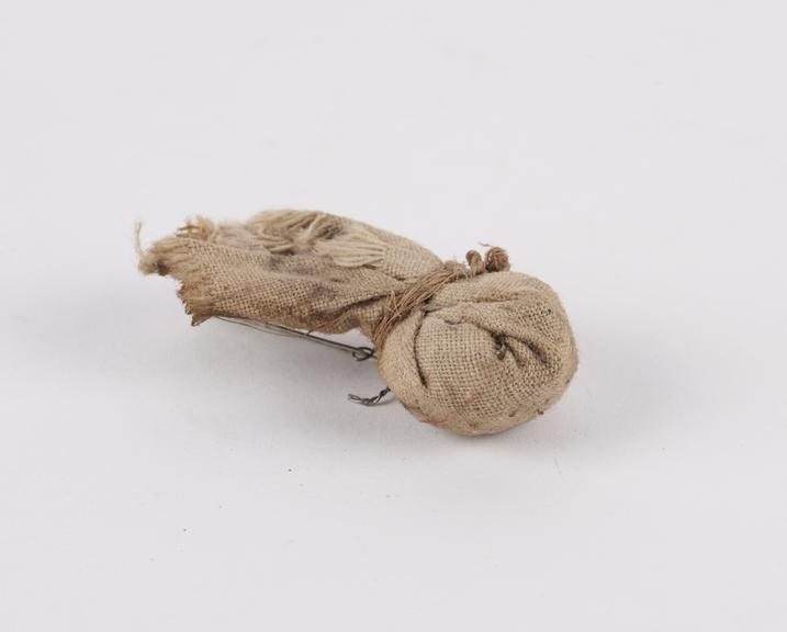 Small bundle of medicine' tied up in piece of white cotton