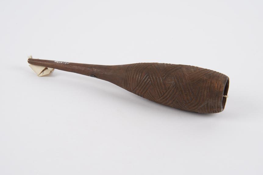 Carved wooden enema funnel, bowl incised with interlacing bands