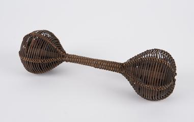 Plaited cane rattle, double ended, containers filled with seeds
