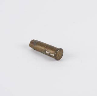 Cartridge case, brass, from Maxim gun