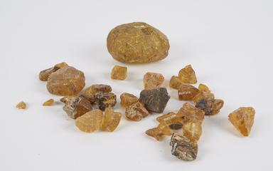 Lump of copal resin, translucent gum from tropical trees, plus  thirty smaller lumps