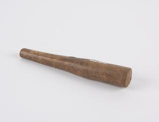 Wooden peg with hole running through its length