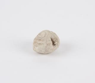 Stone, porous, with indentation, white