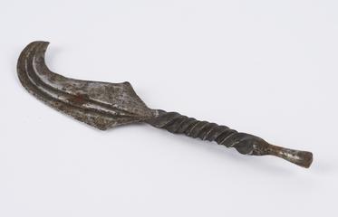 Steel razor, shape resembles machette knife