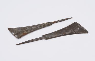 Two steel razors, shape resembles tomahawk blade