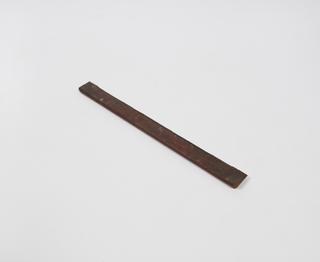 Fragment of wooden cover from photothermograph used at Radcliffe Observatory, Oxford
