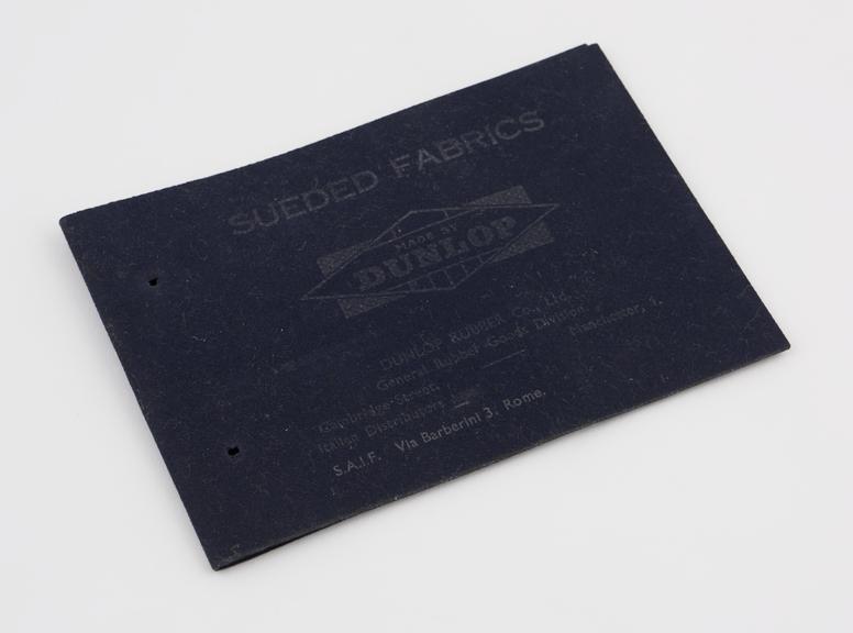 Two rectangular samples of black sueded fabrics