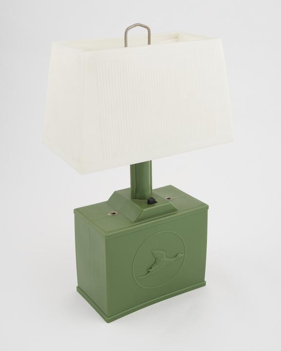 Night light of soft plastic, green base and white shade