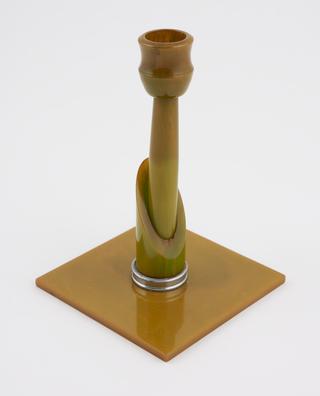 Green/yellow cast phenolic candlestick