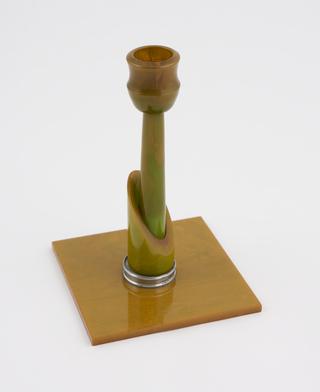 Green/yellow cast phenolic candlestick