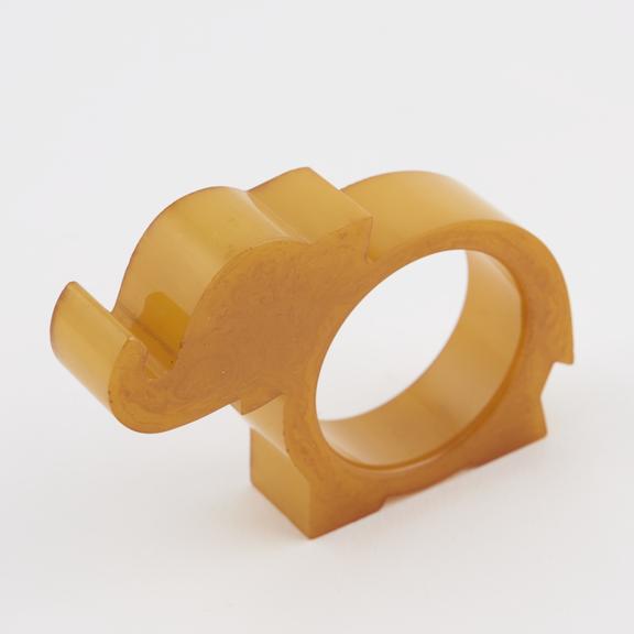 Napkin ring moulded in the form of an elephant with central