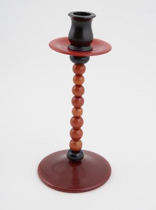 Early plastic candlestick