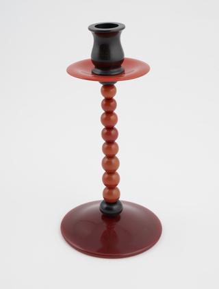 Early plastic candlestick