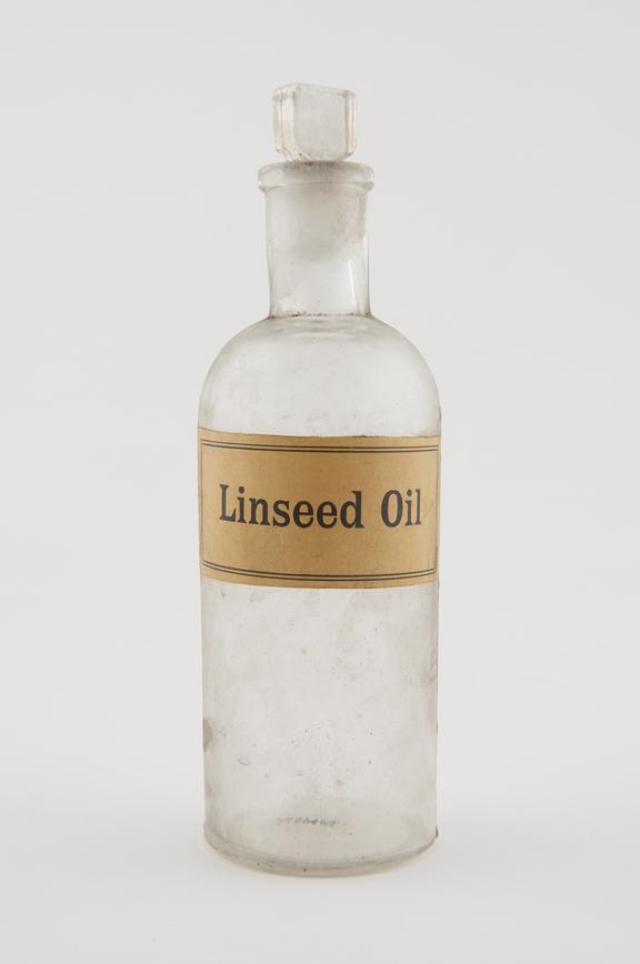 Shop round, clear glass, used for linseed oil, English
