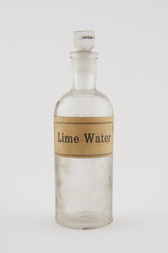 Bottle, shop round, clear glass, for lime water, European