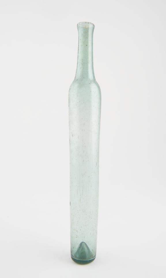 Green glass phial, in the shape of an elongated cylinder