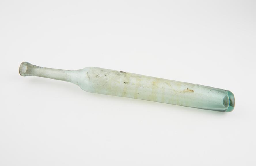 Green glass phial, elongated cylindrical shape