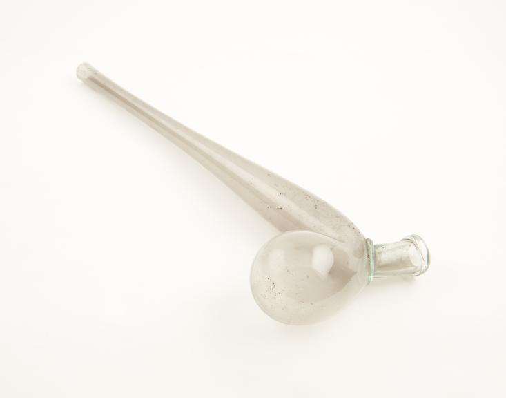 Swan necked retort, clear glass body and neck