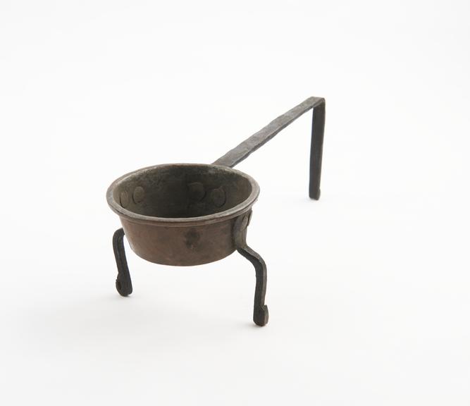 Crucible, circular copper vessel with two iron legs