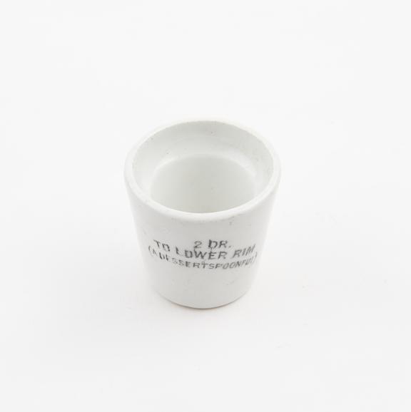 Earthenware measure, glazed, introduced by W