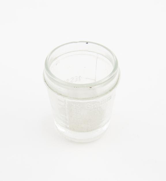 Measuring cylinder, clear glass, probably German, 1900-1910