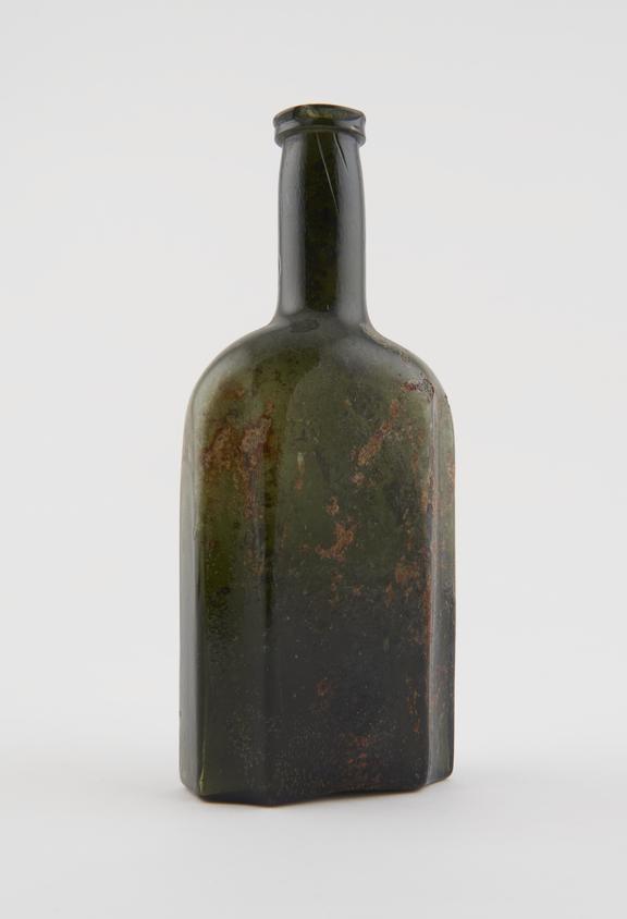 Dark green glass bottle