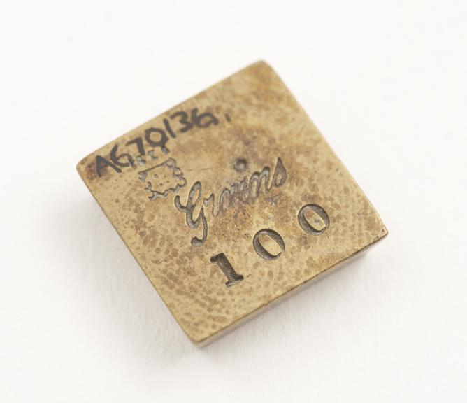 Thick brass square 100 grain weight, English, 1850-1930