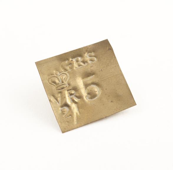 Thin rectangular brass 5 grain weight, English, 1850-1910