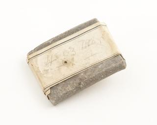 Folded piece of lead