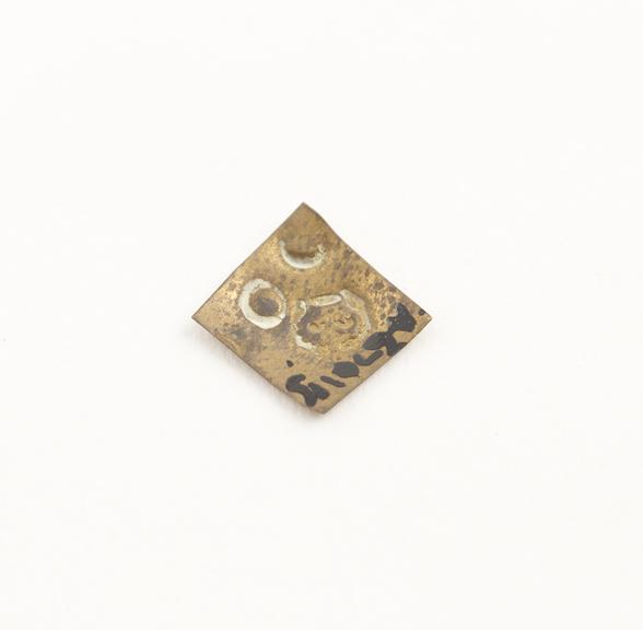 Small square brass 2 grain weight, probably English, 1850-1920