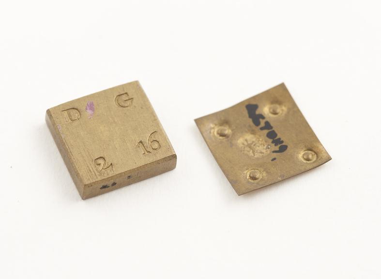 2 square brass weights, 4 grains and 2 dwt 16 grains in value