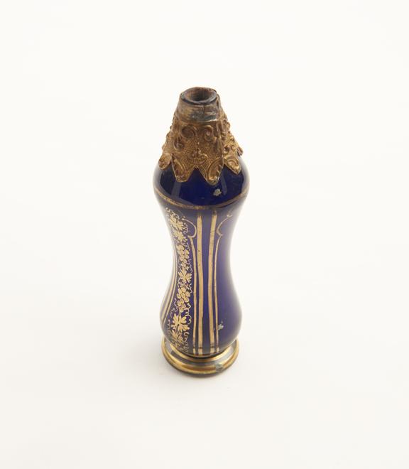 Glass perfume bottle, blue, waisted body, splayed base