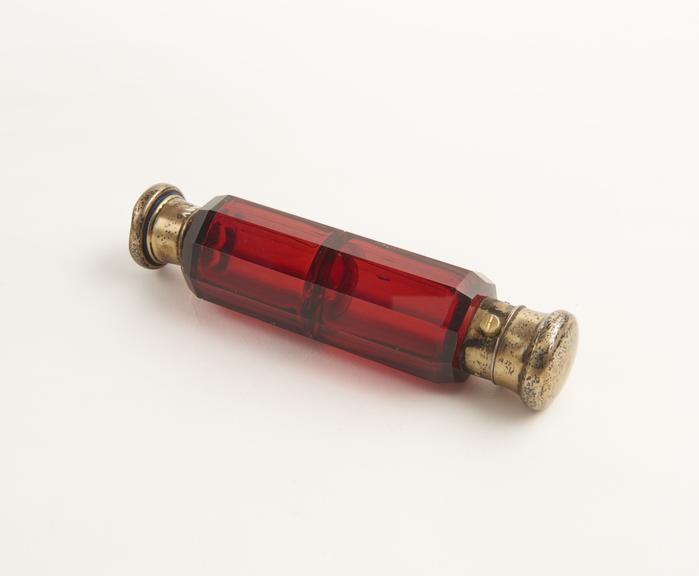 Glass perfume bottle cum vinaigrette, cylindrical double ended