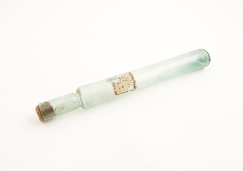 Tall eau de cologne bottle, turquoise glass, possibly French