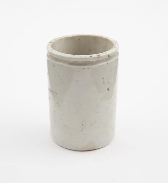 Dispensing pot, earthenware, glazed, cream, English