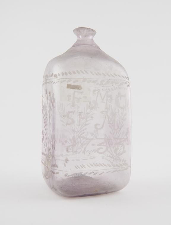 Square medicine bottle with engraved foliate design