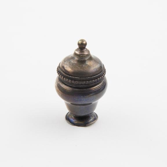 Silver nutmeg grater, in the form of an urn