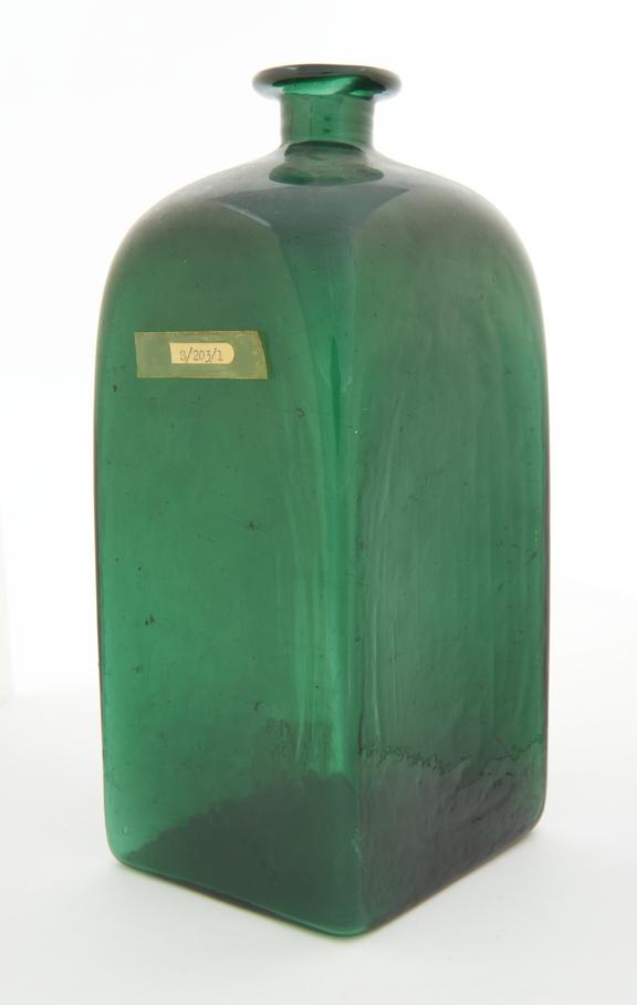 Square storge bottle, green glass, probably English, 1801-1850