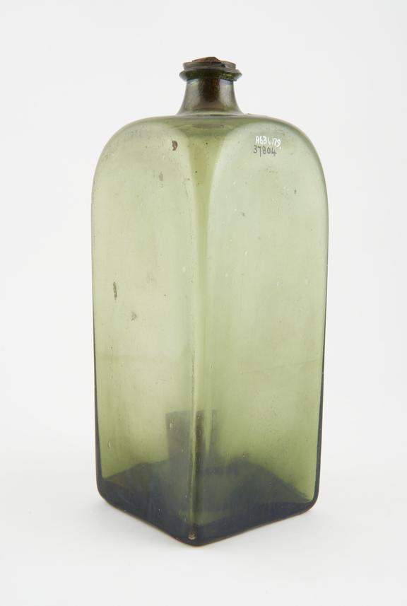 Square bottle, green glass, trace content, possibly Spanish