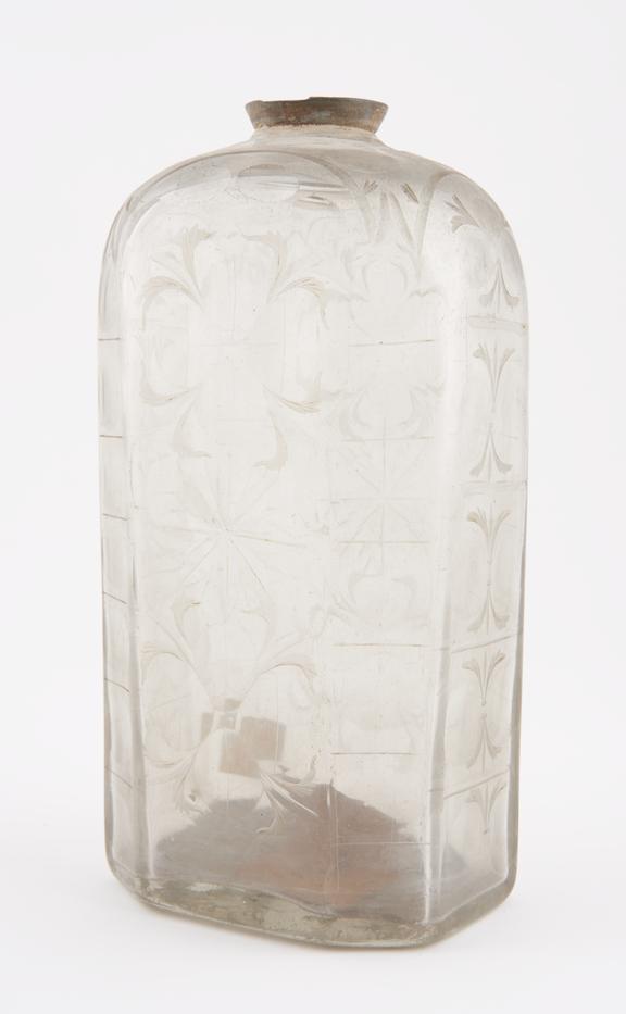 Octagonal storage bottle, clear glass, empty, probably Spanish