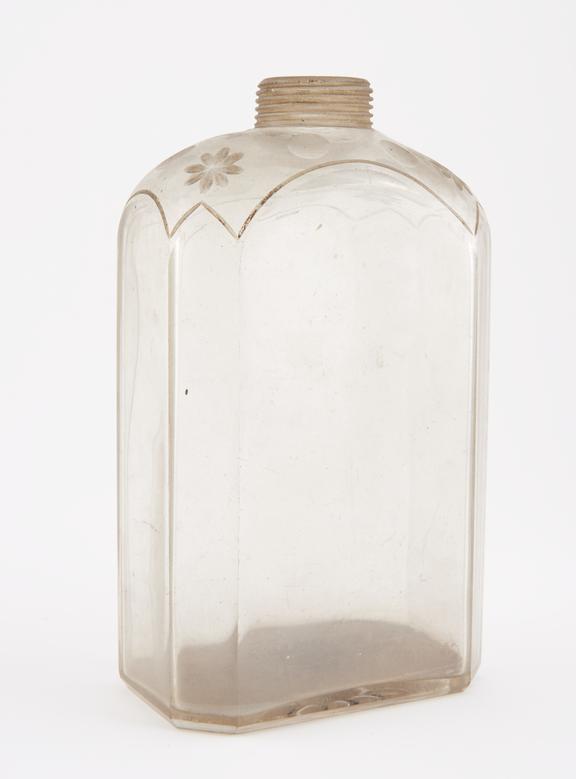 Octagonal storage bottle, clear glass, empty, probably Italian