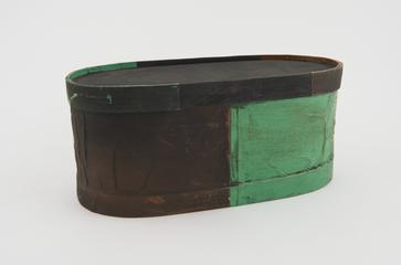 Wooden herb box covered with coloured paper